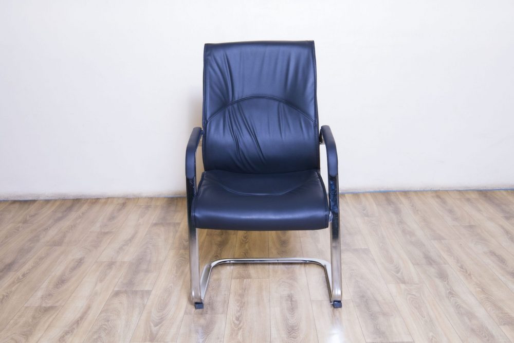 MOG-Executive Mid back  Leather with fixed padded  armrests on cantiliver base Code 805C